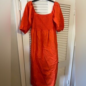 Free assembly smocked top puff sleeve orange dress, NWT size L